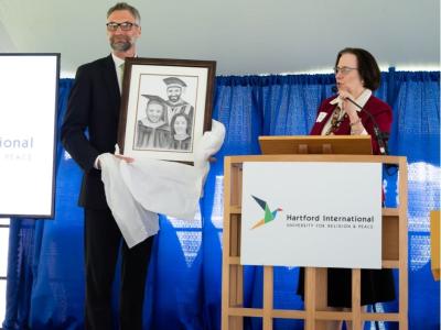 Joel accepting gift of drawing